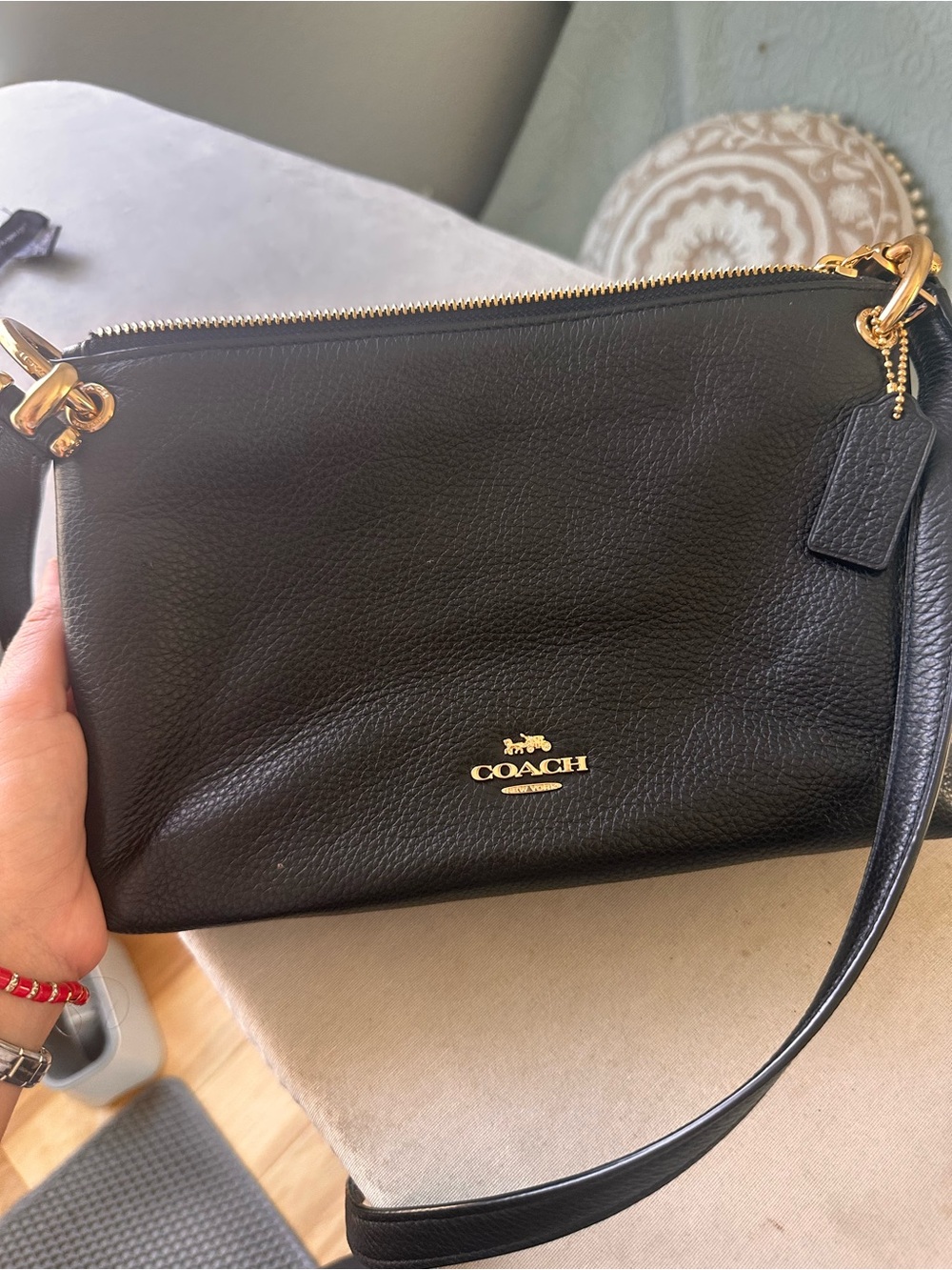 Coach Black Pebbled Leather Wristlet with Gold Accents